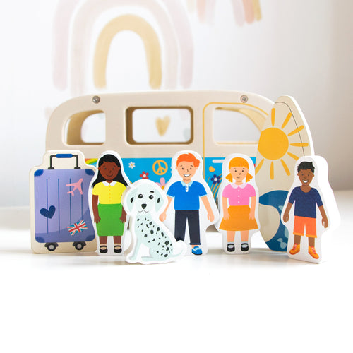 Kids wooden campervan with surfboard and luggage 