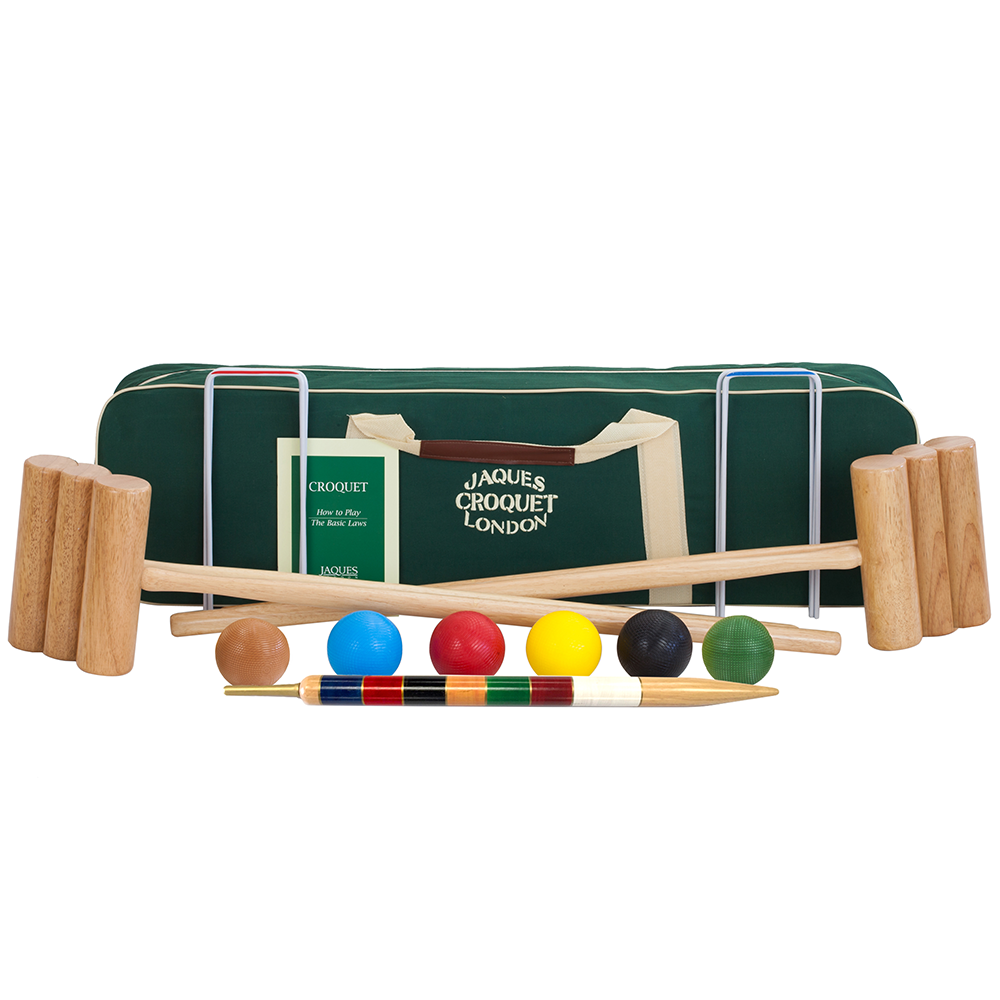 A croquet set displayed on a white background, including wooden mallets, pointed sticks, colored balls, a striped cue, and a green carrying case with a Jacques Croquet London label. 