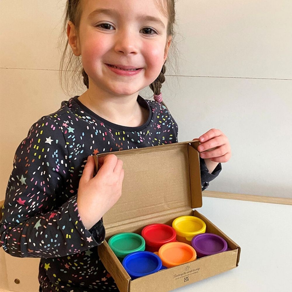  Girl holding finger paints