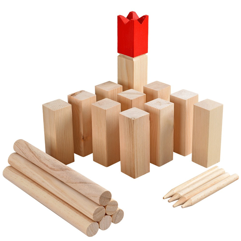 Wooden kubb game all the pieces arranged neatly