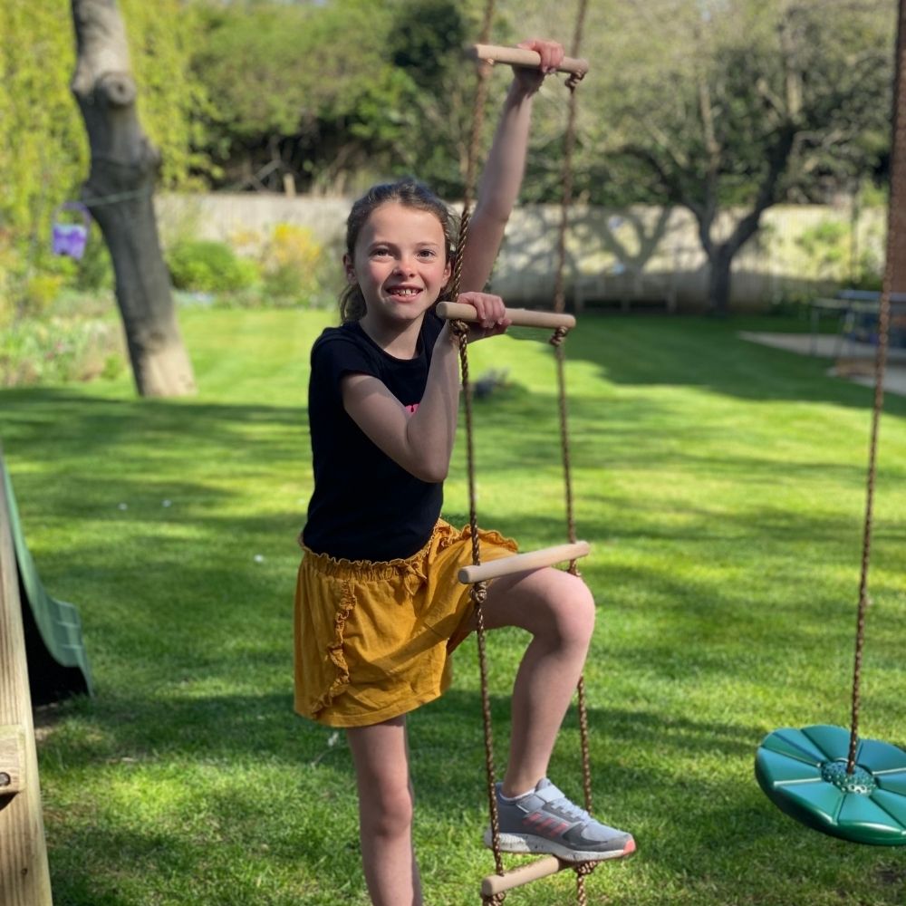  Kids playing on rope ladder 