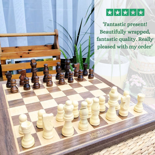 Wooden chess set with pieces on a checkered board, placed indoors. 