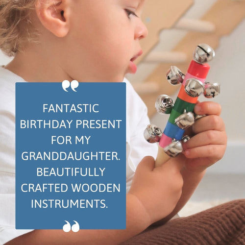 Child holding a colourful wooden instrument with a blue text box featuring a quote about it.