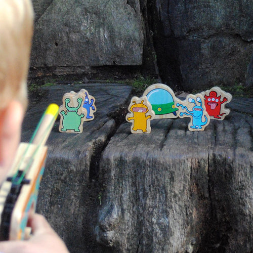Boy Shooting Wooden Aliens  