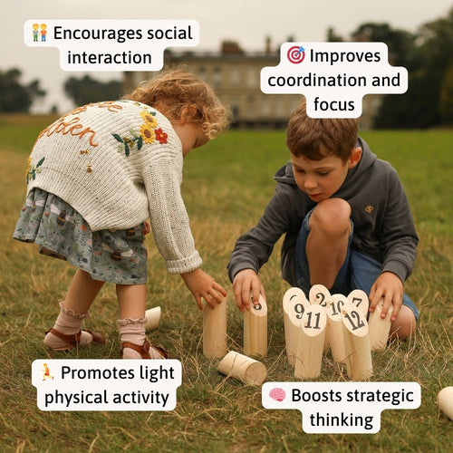 Two children playing with numbered wooden blocks in a grassy field. 