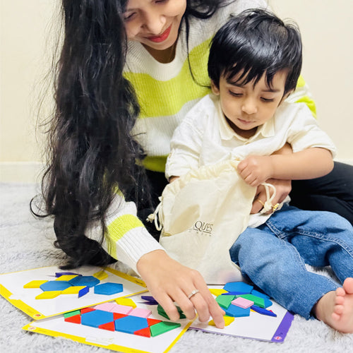   Child playing with mum with the puzzles