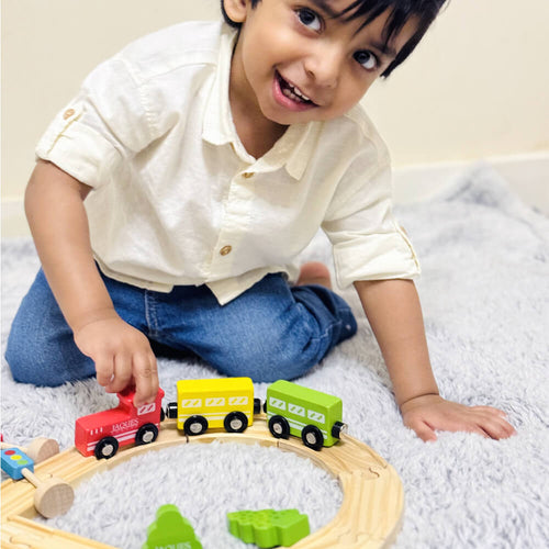  Child playing with train set