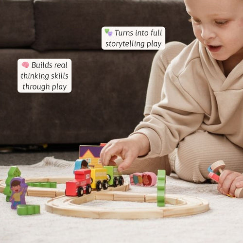 Child playing with a wooden train set on the floor. 
