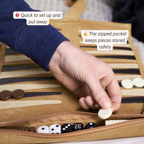 Hand placing a backgammon piece into a zipped pocket of a backgammon set. 