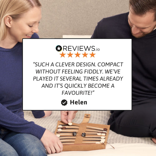 Two people sitting on the floor with a wooden jewellery box, featuring a 5-star review from Helen. 