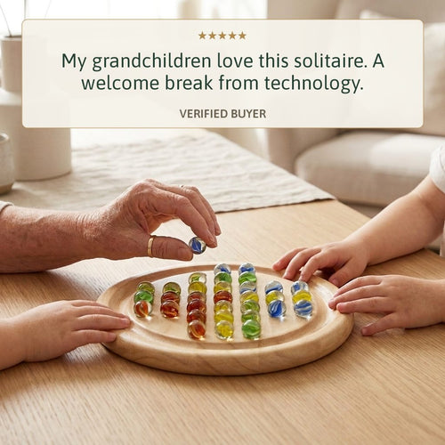 Grandparent and grandchild playing the Jaques wooden solitaire, five star review 