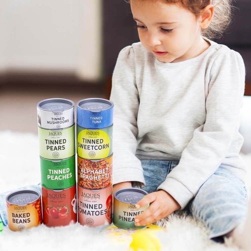  Little girl playing with pretend play food  