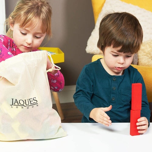  Children taking building blocks out of carry bag