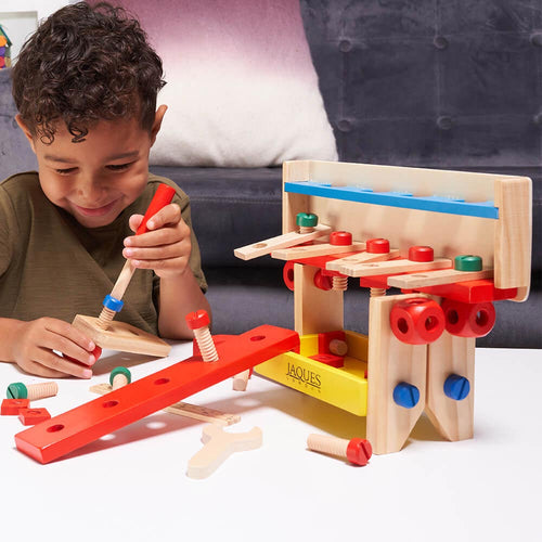  Child using wooden screwdriver 