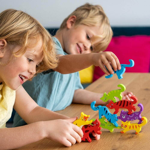 kids wooden cats stacking game - 2 kids playing with the cats 