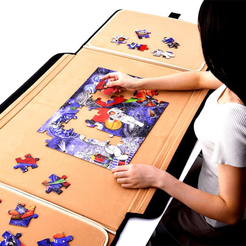 Luxury portable puzzle board - lady seated making a puzzle on the board 