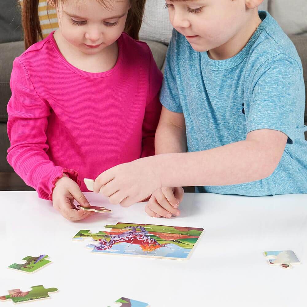  Children making wooden dinosaur puzzles
