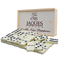 Dominoes double nine game - dominoes displayed with wooden storage box