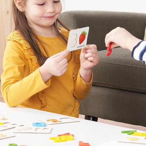  Early years children matching letters with pictures togeher