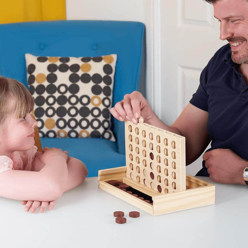  Parent playing score four with child
