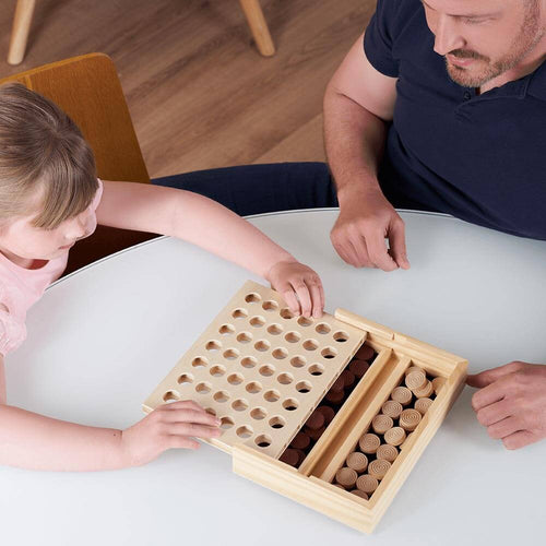  Child and parent playing four in a row together