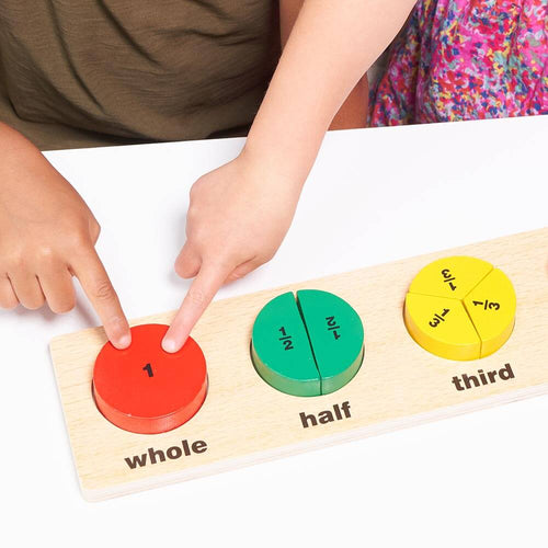  Children pointing at whole section of Children learning with fractions board 