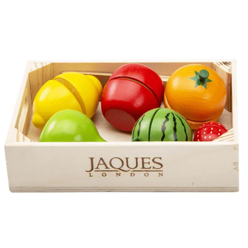 Lemon, apple, orange, pear, watermelon and strawberry in a wooden box
