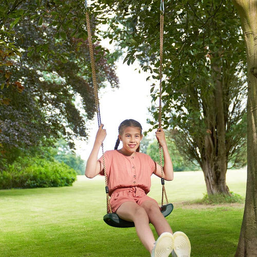 Child on garden swing seat  