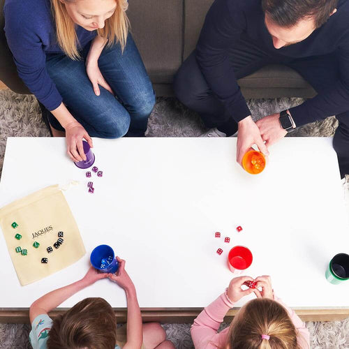  Family playing liars dice game