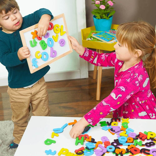  Fun educational game with magnetic letters and numbers - A boy and girl sticking letters on a board 