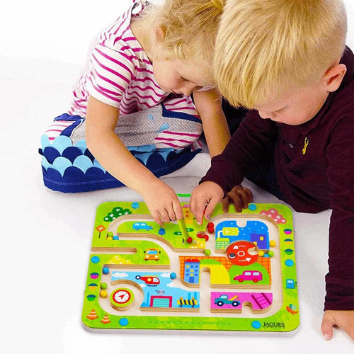  Kids playing with magnetic maze game 