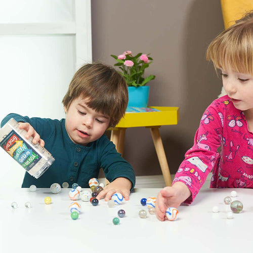  Children pouring out the marbles