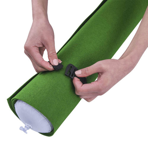  Puzzle roll mat - hands securing elastic band around roll