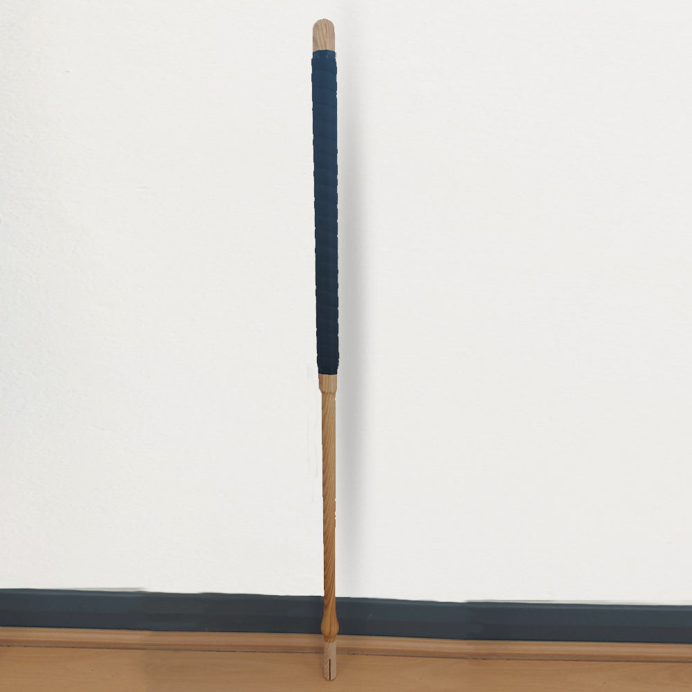  Takair grip for croquet handle, shown standing against wall
