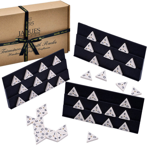  Triangle dominoes family game, with dominoes on holders and some scattered on the surface