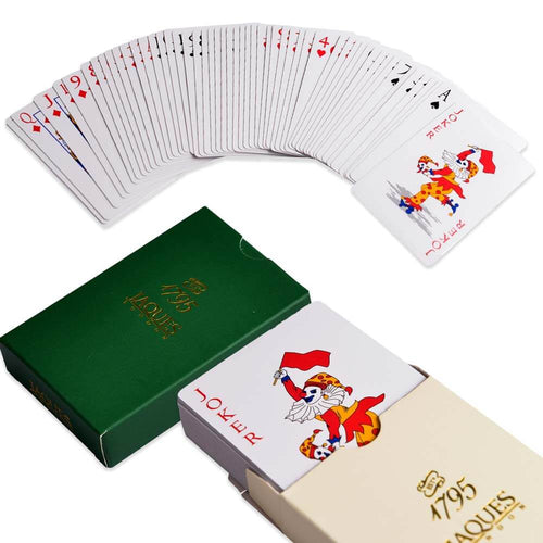 Playing cards fanned out and in boxes 