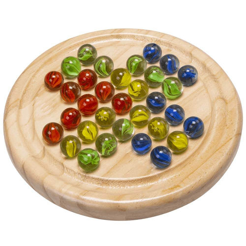 Luxury wooden solitaire game with colourful marbles - board with marbles placed ready for play